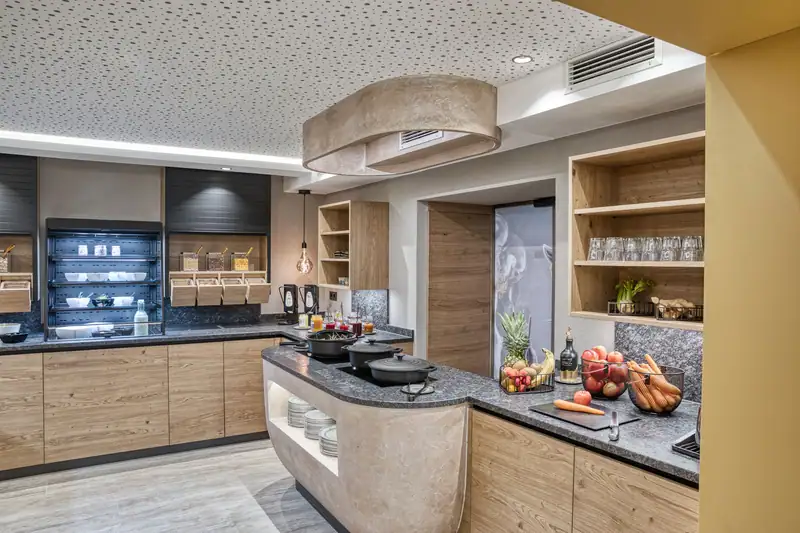 The new breakfast room with wooden fronts, chilled display, muesli drawers, egg station and fruit corner