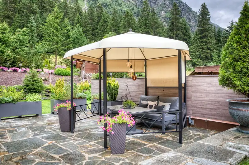 Pavilion with lounge in the hotel garden