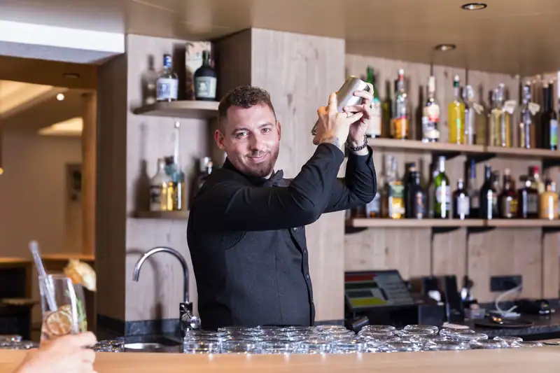 Bartender shaking a cocktail